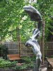 Bird In Hand, a 2004 bronze sculpture by James Peniston. Private collection, Philadelphia